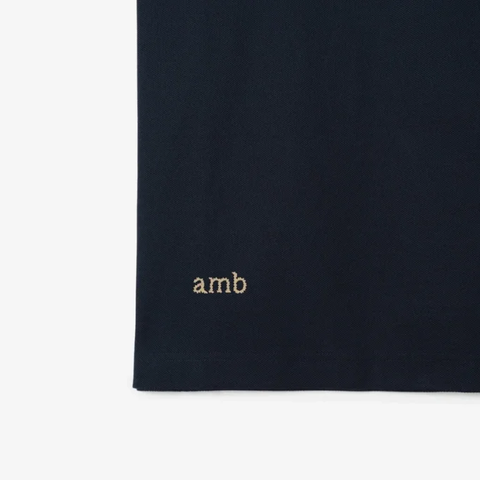 Baumwoll-Poloshirt mit Logo am Kragen