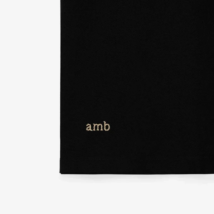 Baumwoll-Poloshirt mit Logo am Kragen